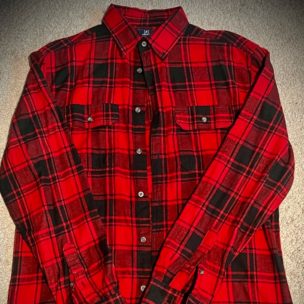 Plaid button down shirt.